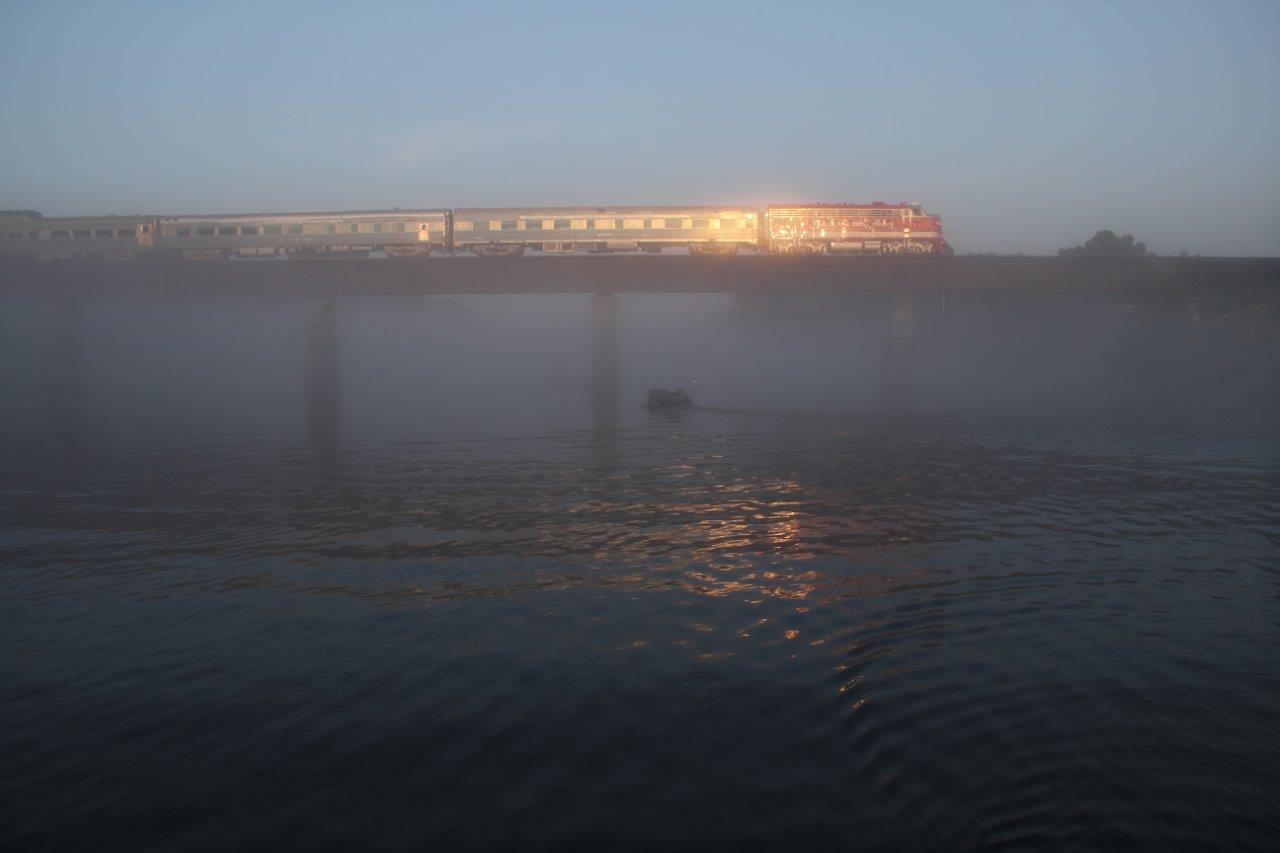 Branson train across the foggy water 
